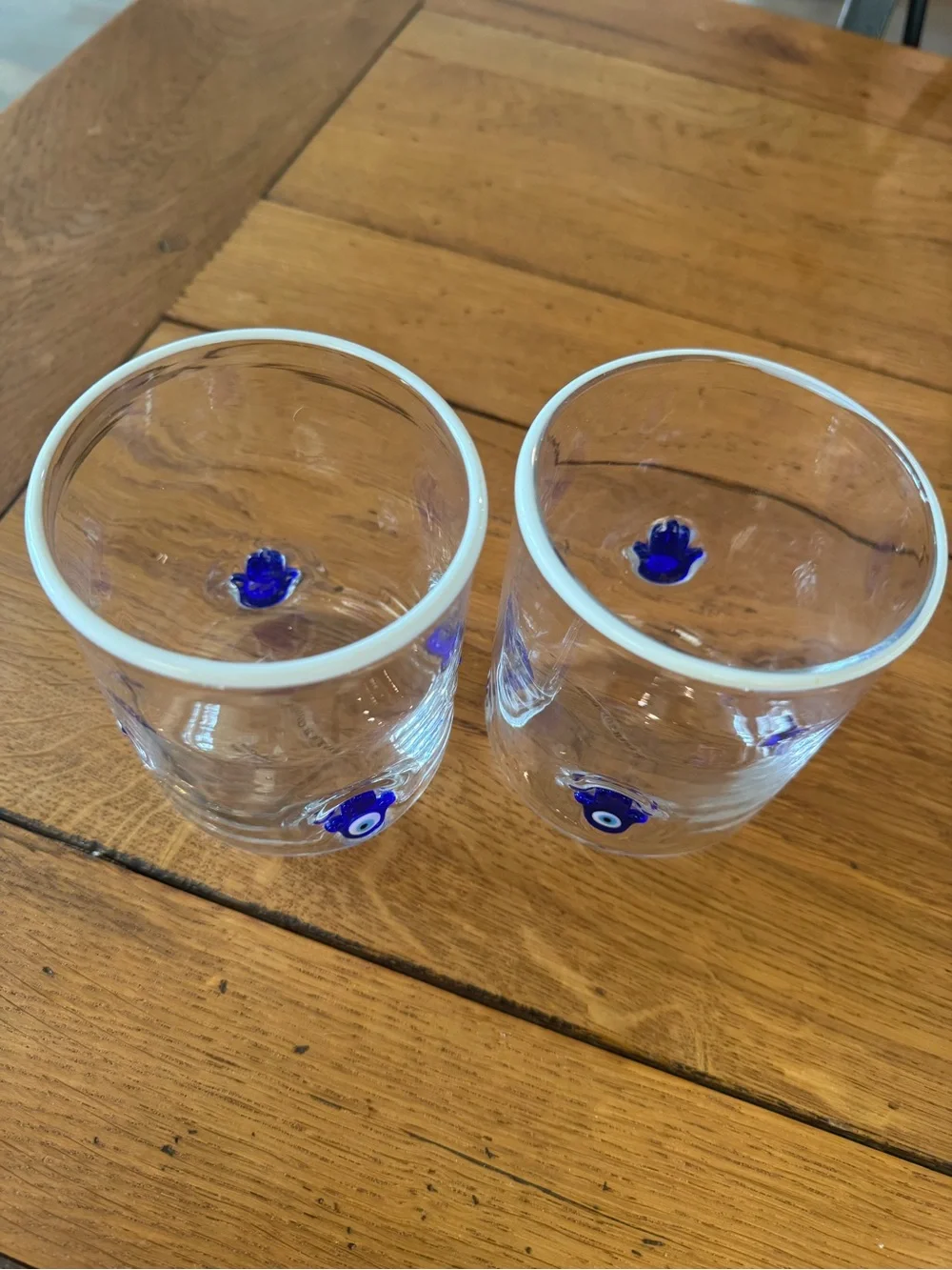 NWT Pair of Anthropologie Clear Juice Glass with Blue Hamsa Motifs